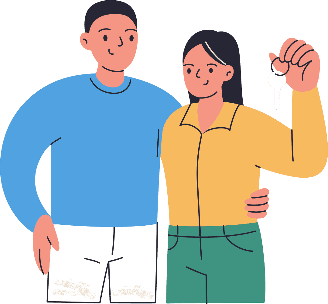 Couple holding keys to their new home